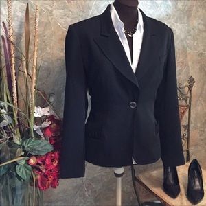 Black suit jacket.    Make me an offer!